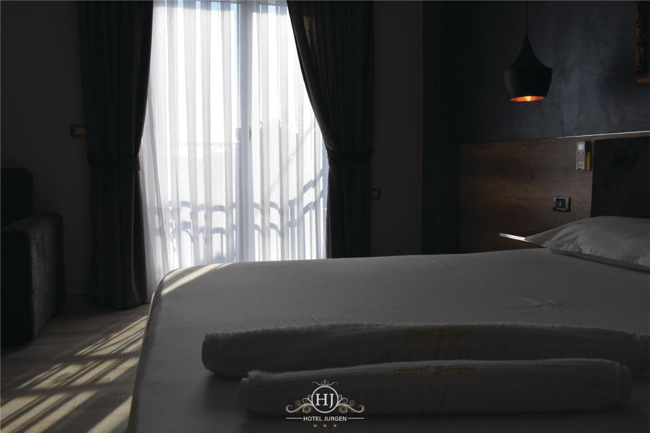 Hotel Jurgen Lezhe Bagian luar foto