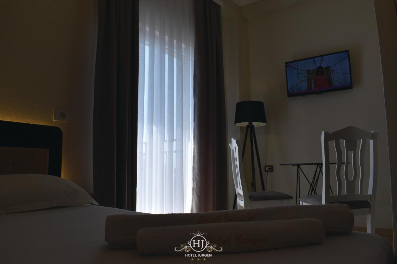 Hotel Jurgen Lezhe Bagian luar foto